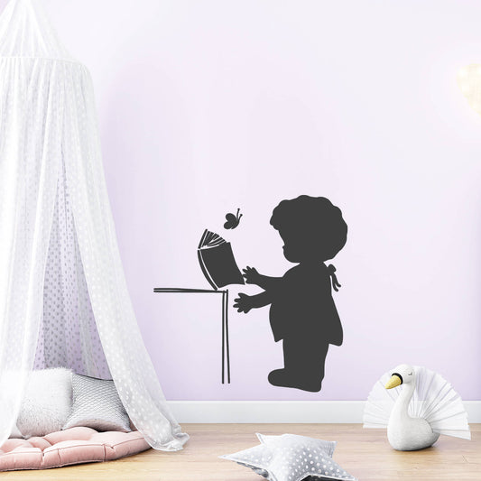 little girl reading book wall decal